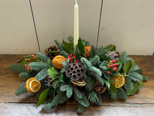 Festive candle table arrangement