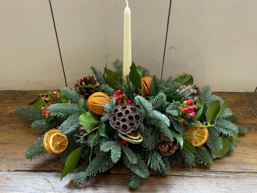 Festive candle table arrangement